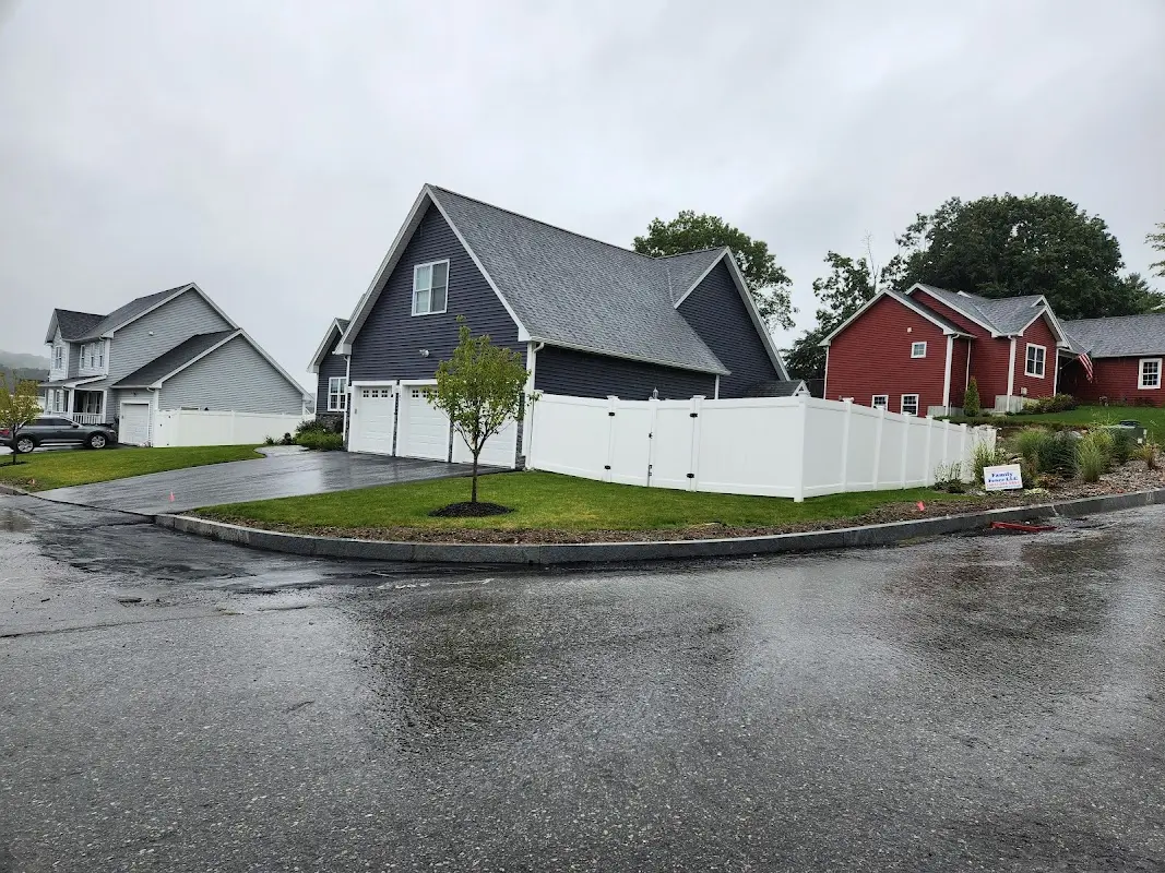 White Vinyl Fence Surrounding A House